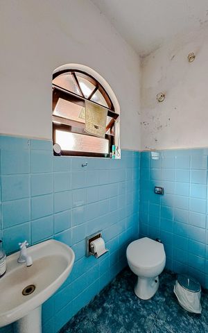 Casa à venda com 180m², 3 quartos e 3 vagasBanheiro de serviço