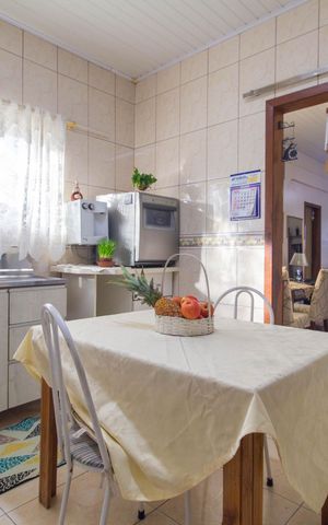 Casa à venda com 150m², 4 quartos e 1 vaga Casa à venda com 150m², 4 quartos e 1 vagaCozinha
