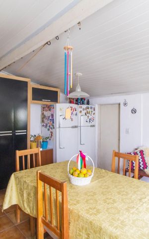 Casa à venda com 150m², 4 quartos e 1 vaga Casa à venda com 150m², 4 quartos e 1 vagaCozinha e Área de Serviço