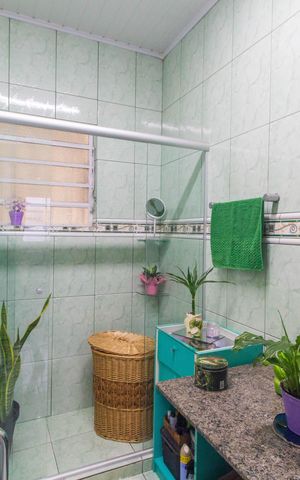 Casa à venda com 150m², 4 quartos e 1 vaga Casa à venda com 150m², 4 quartos e 1 vagaBanheiro da Suíte 2
