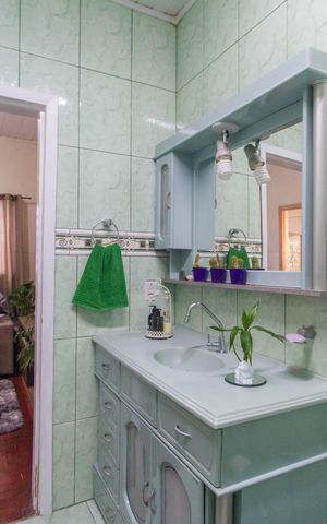 Casa à venda com 150m², 4 quartos e 1 vaga Casa à venda com 150m², 4 quartos e 1 vagaBanheiro da Suíte 2