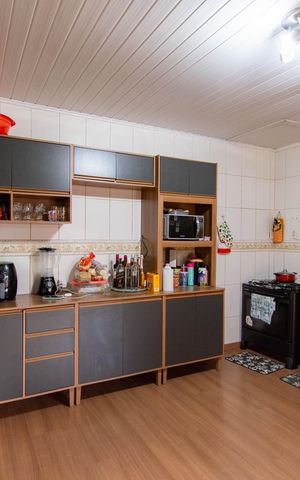 Casa à venda com 200m², 4 quartos e 3 vagas Casa à venda com 200m², 4 quartos e 3 vagasCozinha