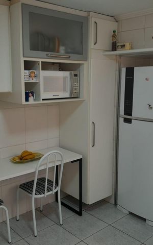 Casa à venda com 210m², 4 quartos e 2 vagas Casa à venda com 210m², 4 quartos e 2 vagasCozinha