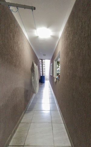 Casa à venda com 600m², 5 quartos e 6 vagas Casa à venda com 600m², 5 quartos e 6 vagasCorredor Externo
