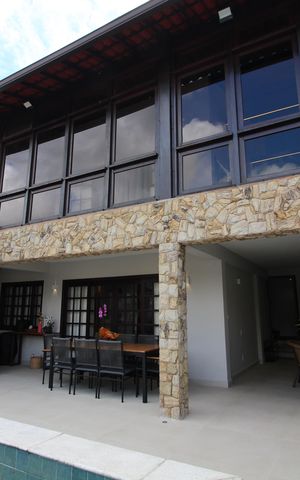 Casa de condomínio à venda com 370m², 4 quartos e 1 vagaÁrea Externa