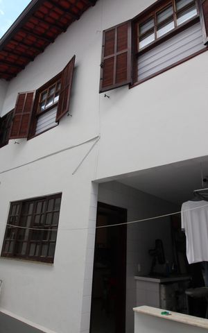 Casa de condomínio à venda com 370m², 4 quartos e 1 vagaFundos