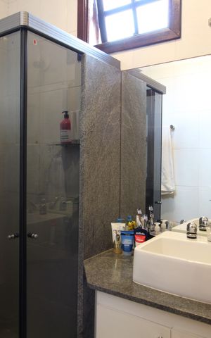 Casa de condomínio à venda com 370m², 4 quartos e 1 vagaBanheiro Social