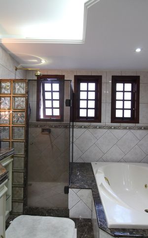 Casa de condomínio à venda com 390m², 4 quartos e 2 vagasQuarto 4 - Banheiro