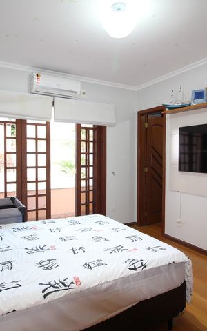 Casa de condomínio à venda com 390m², 4 quartos e 2 vagasQuarto 3 - Suíte