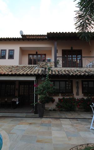 Casa de condomínio à venda com 390m², 4 quartos e 2 vagasFachada Fundos