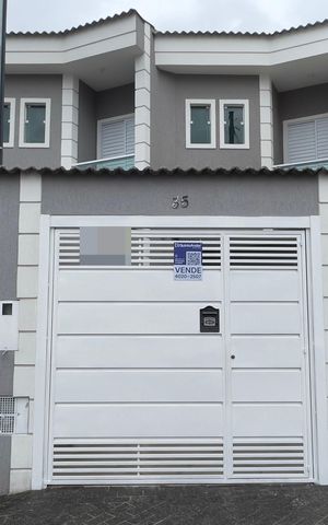 Casa à venda com 95m², 2 quartos e 1 vaga Casa à venda com 95m², 2 quartos e 1 vagaFachada e Placa