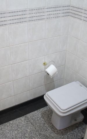 Casa à venda com 557m², 5 quartos e 4 vagasBanheiro Social