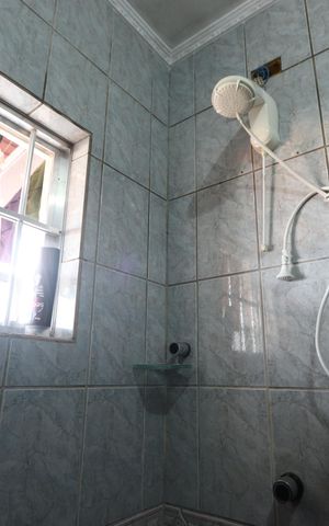 Casa à venda com 277m², 3 quartos e 8 vagasBanheiro da Suíte 2