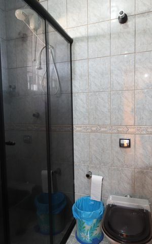 Casa à venda com 277m², 3 quartos e 8 vagasBanheiro da Suíte 2