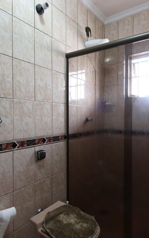 Casa à venda com 277m², 3 quartos e 8 vagasBanheiro da Suíte 1