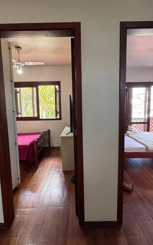 Casa à venda com 200m², 3 quartos e 3 vagas Casa à venda com 200m², 3 quartos e 3 vagasCorredor para os Quartos