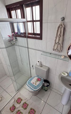 Casa à venda com 200m², 3 quartos e 3 vagas Casa à venda com 200m², 3 quartos e 3 vagasBanheiro da Suíte