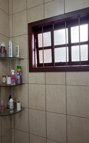 Casa à venda com 200m², 3 quartos e 3 vagas Casa à venda com 200m², 3 quartos e 3 vagasBanheiro