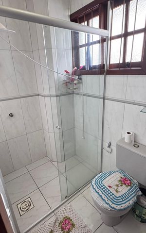 Casa à venda com 200m², 3 quartos e 3 vagas Casa à venda com 200m², 3 quartos e 3 vagasBanheiro da Suíte