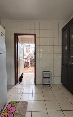 Casa à venda com 200m², 3 quartos e 3 vagas Casa à venda com 200m², 3 quartos e 3 vagasCozinha