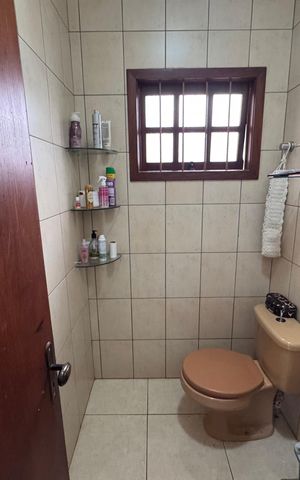 Casa à venda com 200m², 3 quartos e 3 vagas Casa à venda com 200m², 3 quartos e 3 vagasBanheiro