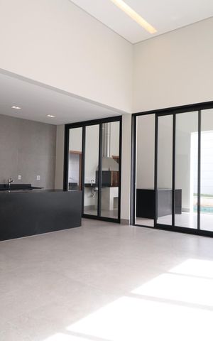 Casa de condomínio para alugar com 218m², 4 quartos e 2 vagasSala