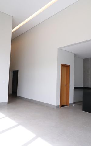 Casa de condomínio para alugar com 218m², 4 quartos e 2 vagasSala