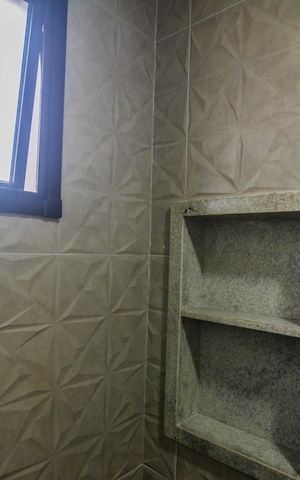 Casa à venda com 130m², 3 quartos e 2 vagas Casa à venda com 130m², 3 quartos e 2 vagasBanheiro da Suíte