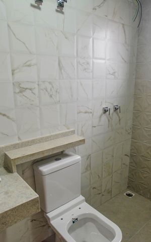 Casa à venda com 130m², 3 quartos e 2 vagas Casa à venda com 130m², 3 quartos e 2 vagasBanheiro da Suíte