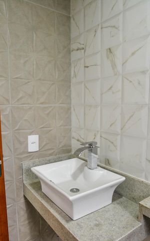 Casa à venda com 130m², 3 quartos e 2 vagas Casa à venda com 130m², 3 quartos e 2 vagasBanheiro da Suíte