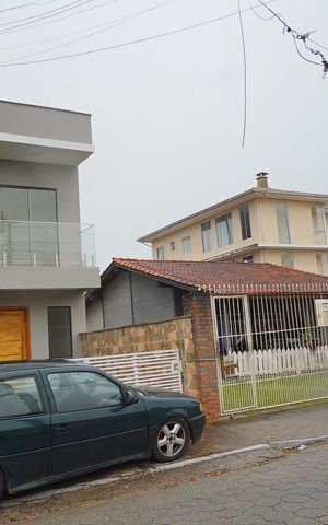 Casa para alugar com 104m², 3 quartos e 2 vagasFachada