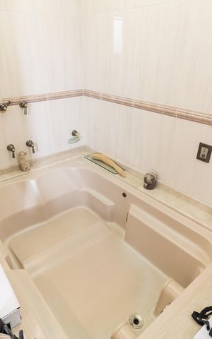 Casa à venda com 600m², 3 quartos e 7 vagas Casa à venda com 600m², 3 quartos e 7 vagasBanheiro da Suíte 1