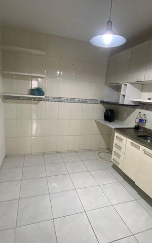 Casa à venda com 60m², 2 quartos e 2 vagas Casa à venda com 60m², 2 quartos e 2 vagasCozinha