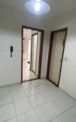 Casa à venda com 60m², 2 quartos e 2 vagas Casa à venda com 60m², 2 quartos e 2 vagasCozinha