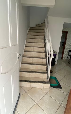 Casa à venda com 60m², 2 quartos e 2 vagas Casa à venda com 60m², 2 quartos e 2 vagasSala