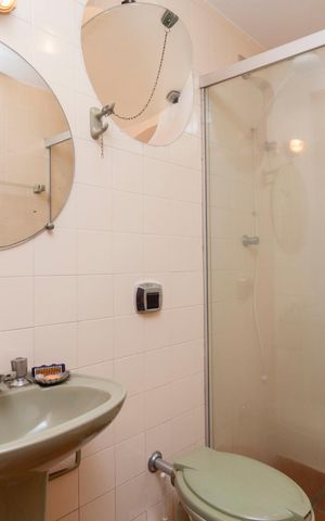 Casa de condomínio à venda com 250m², 4 quartos e 4 vagasBanheiro Social