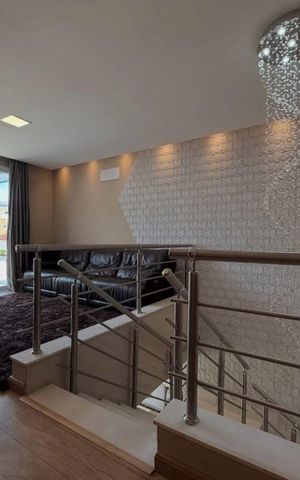 Casa de condomínio à venda com 402m², 4 quartos e 4 vagasSala
