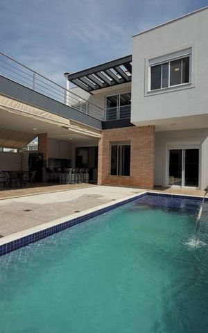 Casa de condomínio à venda com 402m², 4 quartos e 4 vagasPiscina