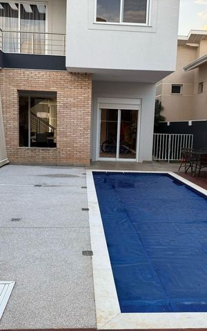 Casa de condomínio à venda com 402m², 4 quartos e 4 vagasPiscina