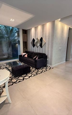 Casa de condomínio à venda com 402m², 4 quartos e 4 vagasSala