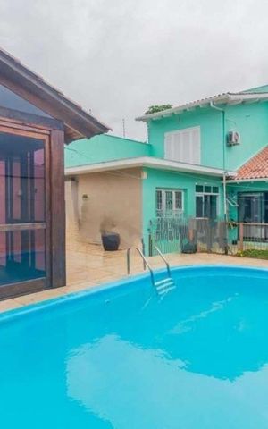 Casa à venda com 330m², 4 quartos e 3 vagas Casa à venda com 330m², 4 quartos e 3 vagasPiscina