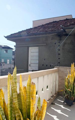 Casa à venda com 300m², 5 quartos e 5 vagasQuarto 3 Suíte Detalhe Sacada