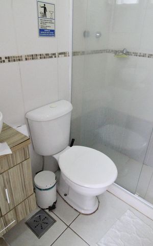 Casa de condomínio à venda com 200m², 4 quartos e 2 vagasÁrea de serviço - Banheiro
