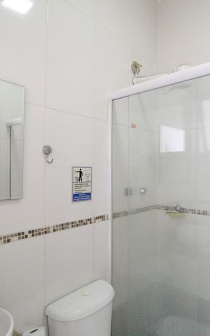 Casa de condomínio à venda com 200m², 4 quartos e 2 vagasÁrea de serviço - Banheiro
