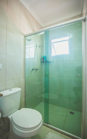 Casa de condomínio à venda com 135m², 3 quartos e 2 vagas Casa de condomínio à venda com 135m², 3 quartos e 2 vagasBanheiro da Suíte