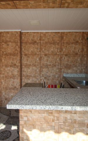 Casa à venda com 130m², 3 quartos e sem vagaCozinha gourmet
