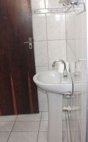 Casa à venda com 230m², 4 quartos e 6 vagasBanheiro da 2ª Suíte