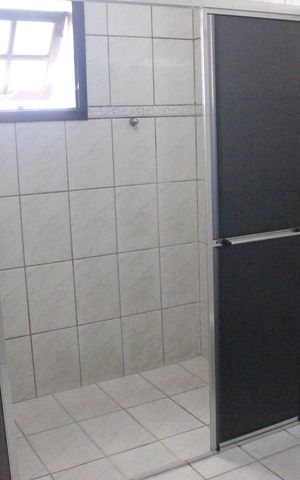 Casa à venda com 230m², 4 quartos e 6 vagasBanheiro da Varanda da 1ª Suíte