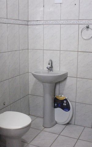Casa à venda com 230m², 4 quartos e 6 vagasBanheiro da Varanda da 1ª Suíte