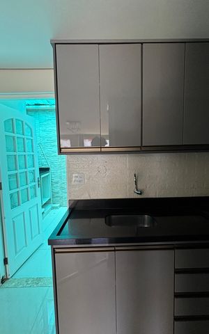 Casa de condomínio à venda com 100m², 2 quartos e 1 vaga Casa de condomínio à venda com 100m², 2 quartos e 1 vagaCozinha